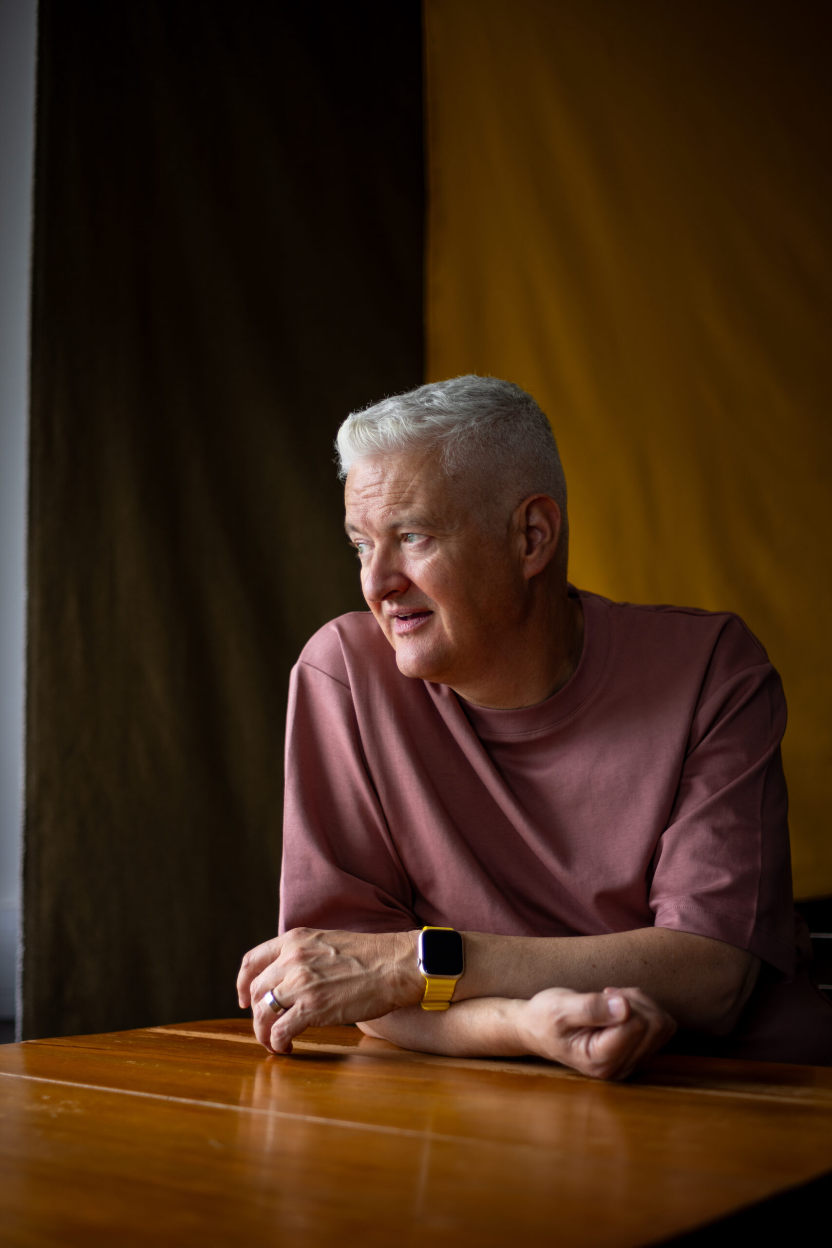 A man in a studio being photographed